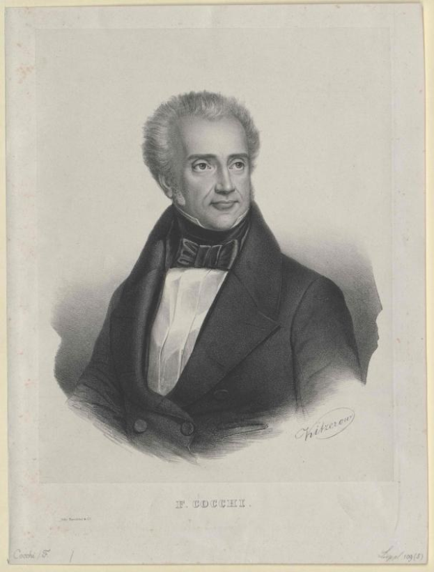 Schwarzes und weißes Porträt des Komponisten F. Cocchi in einem Smoking mit ernstem Gesichtsausdruck, beschriftet mit "Die Musik der Oper" unten.