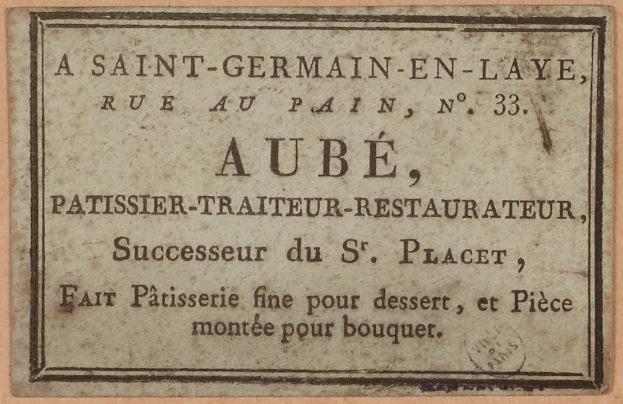 Eine alte Visitenkarte mit der Aufschrift "A Saint Germain-en-Laye, Rue au Pain, No. 33"