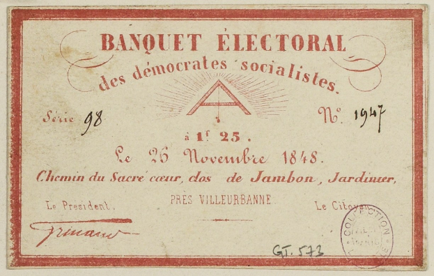 Alter Umschlag mit roter Umrandung, der ein Stempel und den Text 'Banquet Electoral des Democrats Socialists' trägt.
